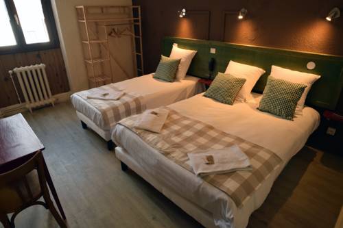 Imagen de la habitación del Hotel Le Genève. Foto 16