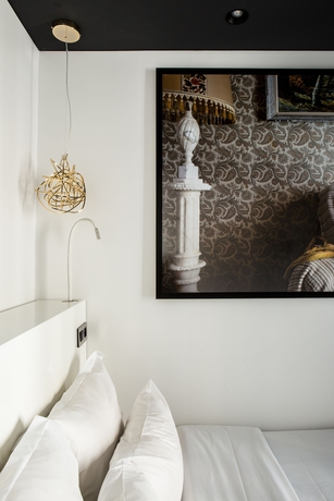 Imagen de la habitación del Hotel Le General. Foto 11