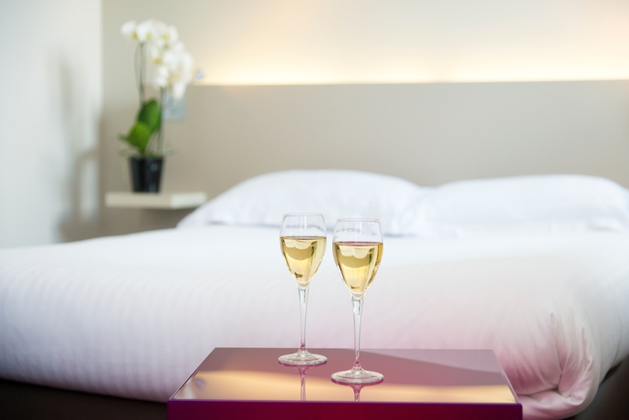 Imagen de la habitación del Hotel Le Germinal. Foto 10