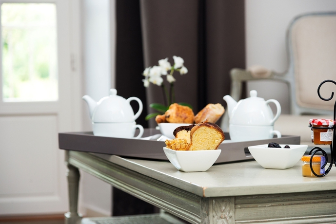 Imagen de la habitación del Hotel Le Germinal. Foto 16