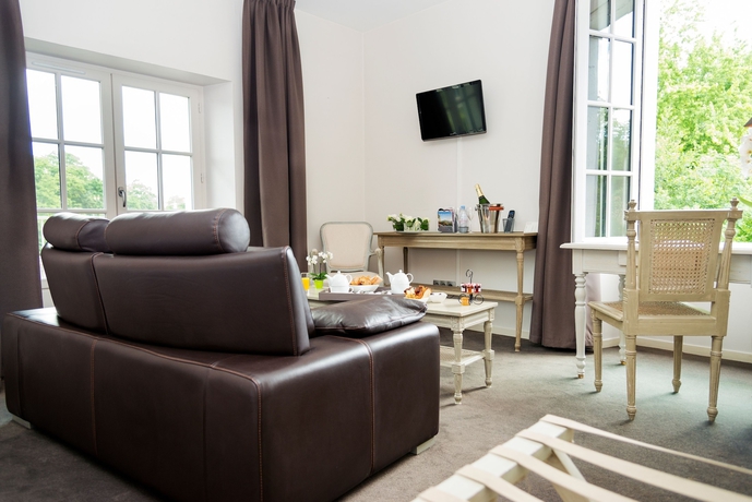 Imagen de la habitación del Hotel Le Germinal. Foto 17