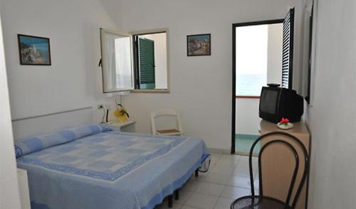 Imagen de la habitación del Hotel Le Ghiaie. Foto 8