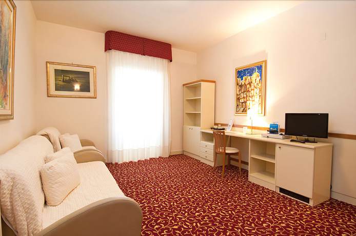 Imagen de la habitación del Hotel Le Ginestre Family Wellness. Foto 3