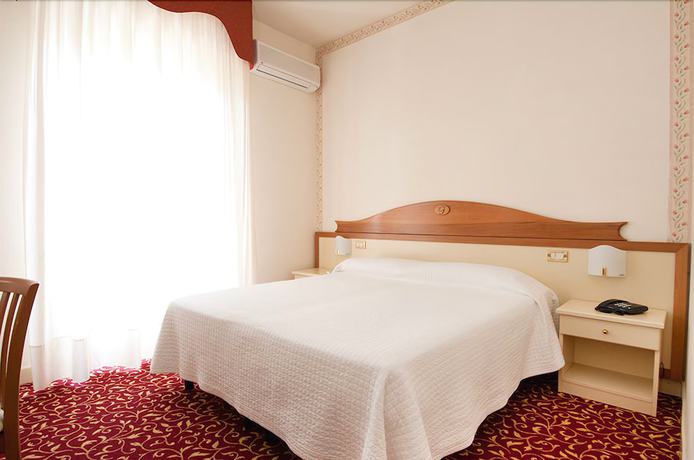 Imagen de la habitación del Hotel Le Ginestre Family Wellness. Foto 4
