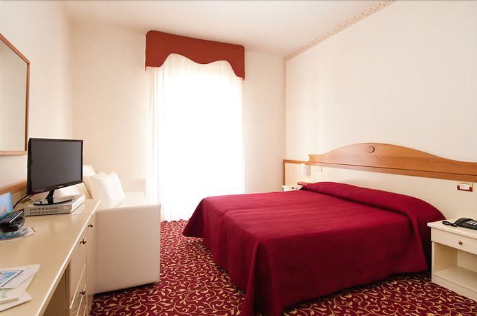 Imagen de la habitación del Hotel Le Ginestre Family Wellness. Foto 10