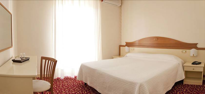 Imagen de la habitación del Hotel Le Ginestre Family Wellness. Foto 11