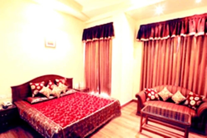 Imagen de la habitación del Hotel Le Golden. Foto 16