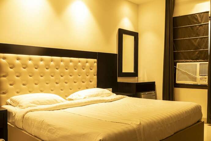 Imagen de la habitación del Hotel Le Golden. Foto 19