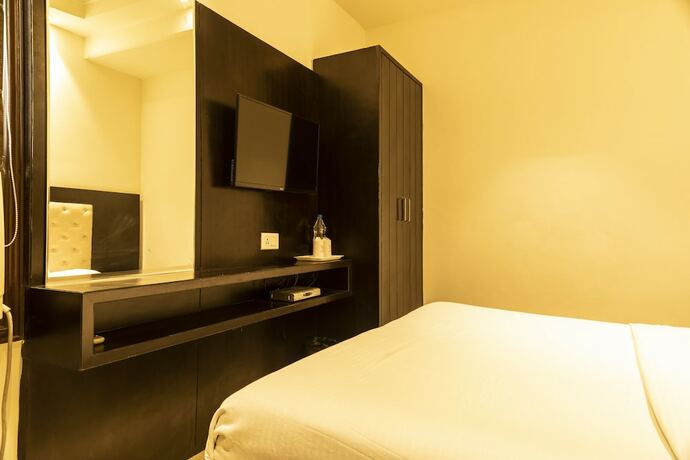 Imagen de la habitación del Hotel Le Golden. Foto 21