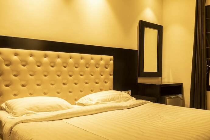 Imagen de la habitación del Hotel Le Golden. Foto 22