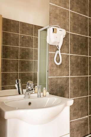 Imagen de la habitación del Hotel Le Grand Albert 1er. Foto 15