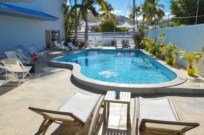 Imagen de la piscina del Hotel Le Grand Bleu, Saint-Gilles-les-Bains. Foto 20