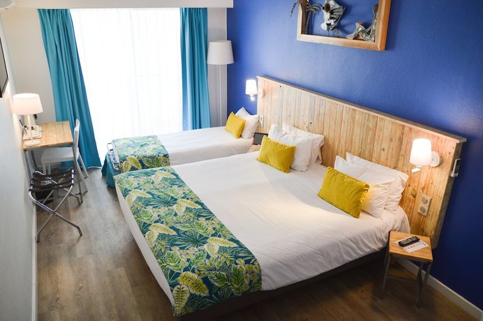 Imagen de la habitación del Hotel Le Grand Bleu, Saint-gilles-les-bains. Foto 2