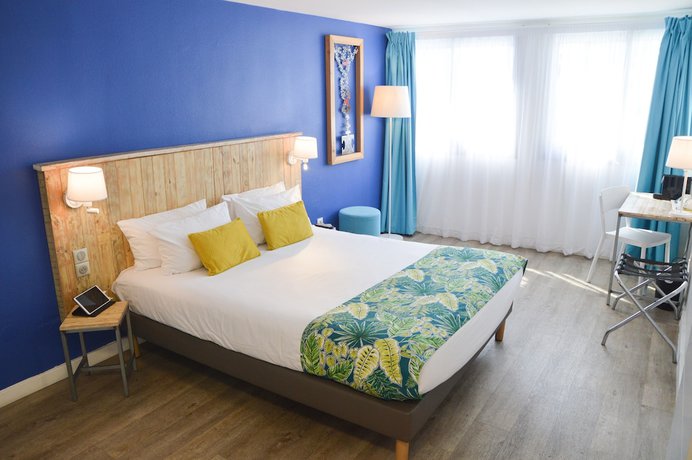 Imagen de la habitación del Hotel Le Grand Bleu, Saint-gilles-les-bains. Foto 9