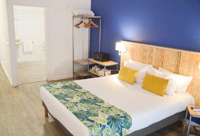 Imagen de la habitación del Hotel Le Grand Bleu, Saint-gilles-les-bains. Foto 11