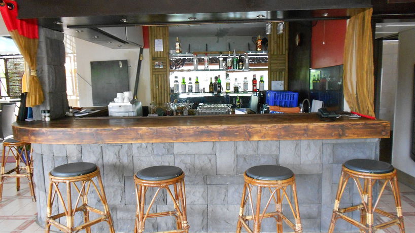 Imagen del bar/restaurante del Hotel Le Grand Bleu, Trou aux Biches. Foto 2