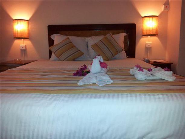 Imagen de la habitación del Hotel Le Grand Bleu, Trou aux Biches. Foto 5