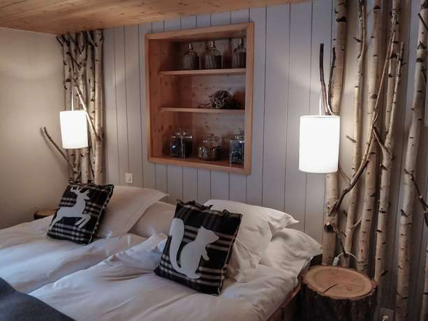 Imagen de la habitación del Hotel Le Grand Chalet Favre. Foto 8