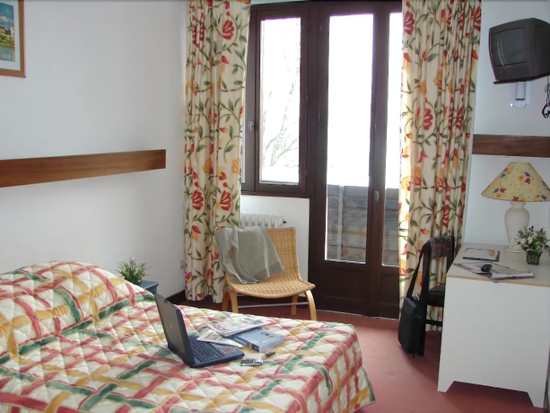 Imagen de la habitación del Hotel Le Grand De Besse. Foto 9