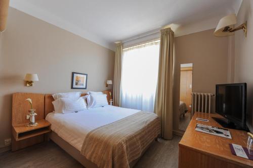 Imagen de la habitación del Hotel Le Grand, Estrasburgo. Foto 7