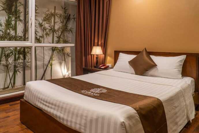 Imagen de la habitación del Hotel Le Grand Hanoi. Foto 16