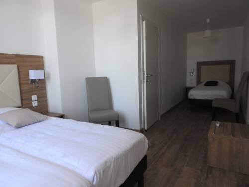 Imagen de la habitación del Hotel Le Grand Hôtel Molière. Foto 2