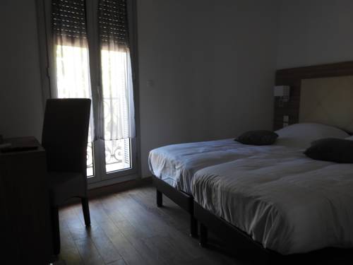 Imagen de la habitación del Hotel Le Grand Hôtel Molière. Foto 9