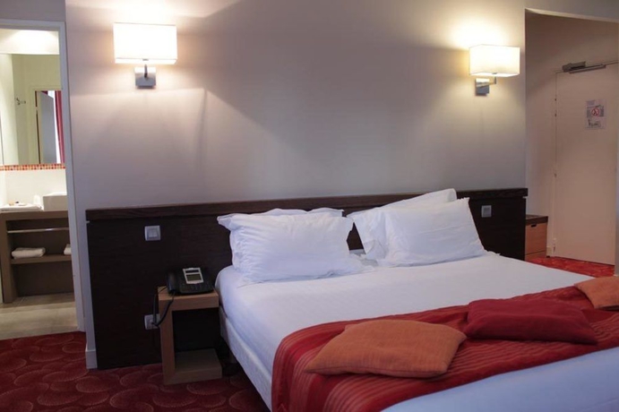 Imagen de la habitación del Hotel Le Grand H&ocirc;tel de Normandie. Foto 7