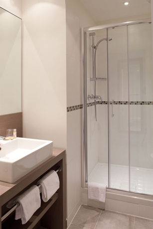 Imagen de la habitación del Hotel Le Grand H&ocirc;tel de Normandie. Foto 8