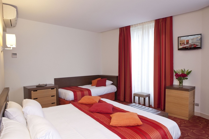 Imagen de la habitación del Hotel Le Grand H&ocirc;tel de Normandie. Foto 9