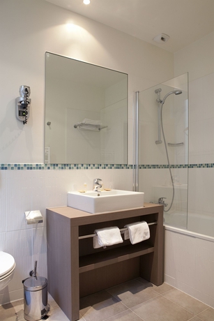 Imagen de la habitación del Hotel Le Grand H&ocirc;tel de Normandie. Foto 10