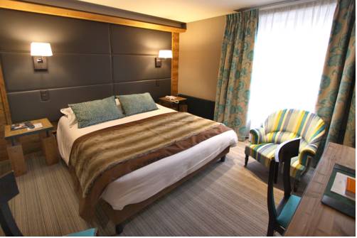 Imagen de la habitación del Hotel Le Grand Hotel & Spa. Foto 3
