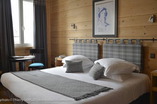 Imagen de la habitación del Hotel Le Grand Hotel & Spa. Foto 7