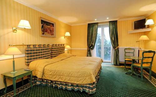 Imagen de la habitación del Hotel Le Grand Hotel & Spa. Foto 10