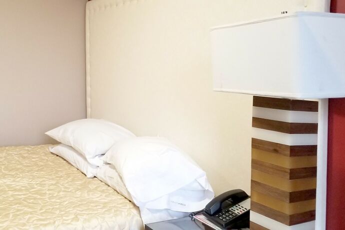 Imagen de la habitación del Hotel Le Grand Kent Motel. Foto 19