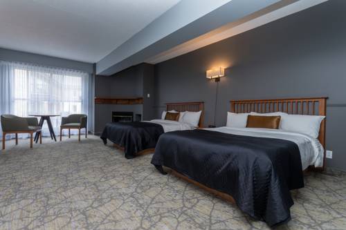 Imagen de la habitación del Hotel Le Grand Lodge Mont Tremblant. Foto 11