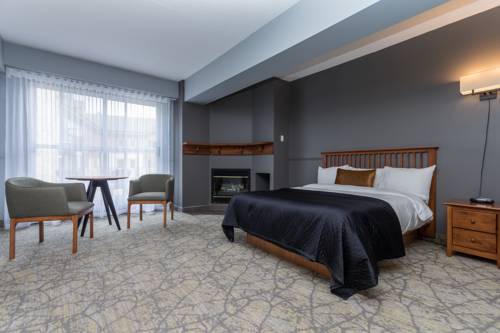 Imagen de la habitación del Hotel Le Grand Lodge Mont Tremblant. Foto 13