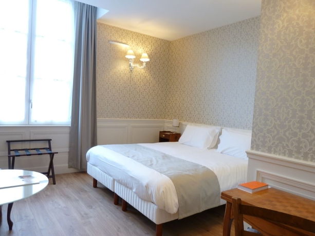 Imagen de la habitación del Hotel Le Grand Monarque, Azay Le Rideau. Foto 7