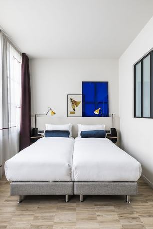 Imagen de la habitación del Hotel Le Grand Quartier. Foto 11