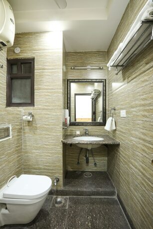Imagen de la habitación del Hotel Le Grand Regency. Foto 19