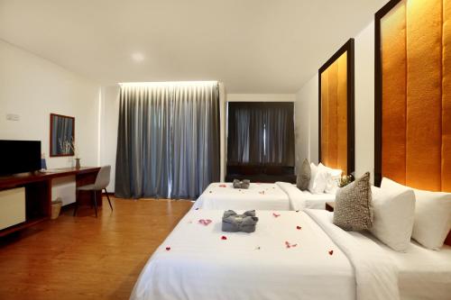 Imagen de la habitación del Hotel Le Grande Indochine. Foto 17