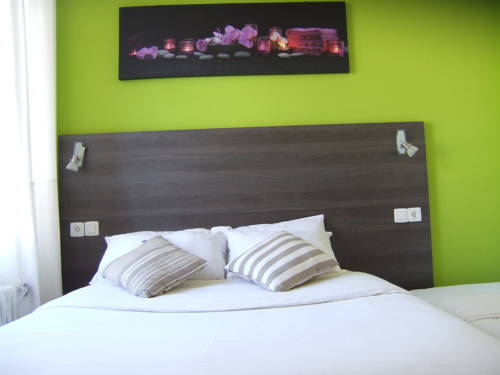 Imagen de la habitación del Hotel Le Green. Foto 3