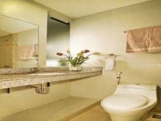 Imagen de la habitación del Hotel Le Green Tondano. Foto 15