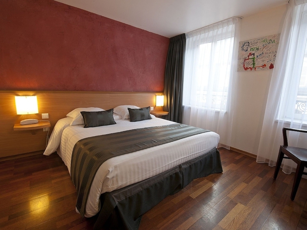 Imagen de la habitación del Hotel Le Grillon. Foto 5