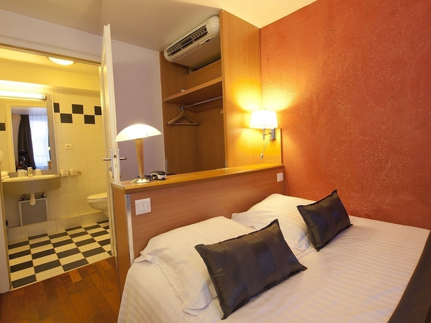 Imagen de la habitación del Hotel Le Grillon. Foto 8