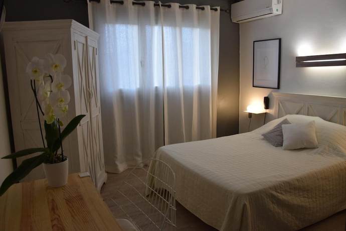 Imagen de la habitación del Hotel Le Grillon, L'&Icirc;le-Rousse. Foto 2