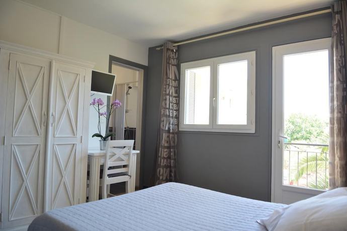 Imagen de la habitación del Hotel Le Grillon, L'&Icirc;le-Rousse. Foto 5