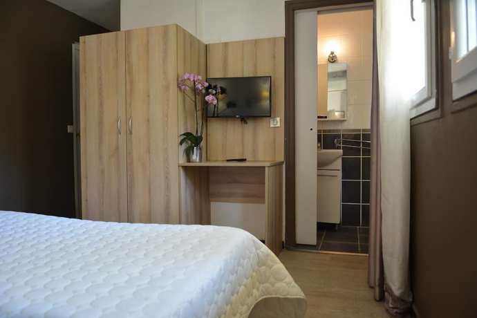 Imagen de la habitación del Hotel Le Grillon, L'&Icirc;le-Rousse. Foto 7