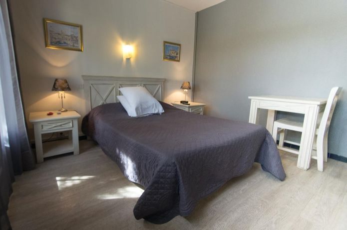Imagen de la habitación del Hotel Le Grillon, L'&Icirc;le-Rousse. Foto 10