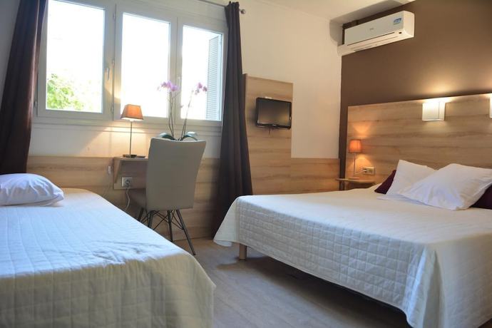 Imagen de la habitación del Hotel Le Grillon, L'&Icirc;le-Rousse. Foto 15